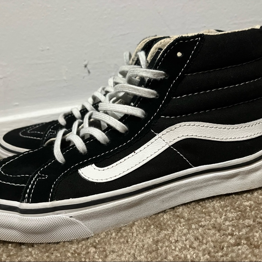 Black high-top Vans